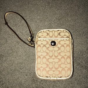 Gold Coach wrislet with front pocket